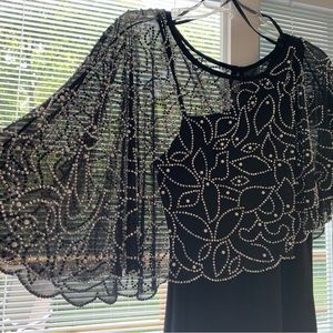 Beautiful black gown with beaded overlay cape.